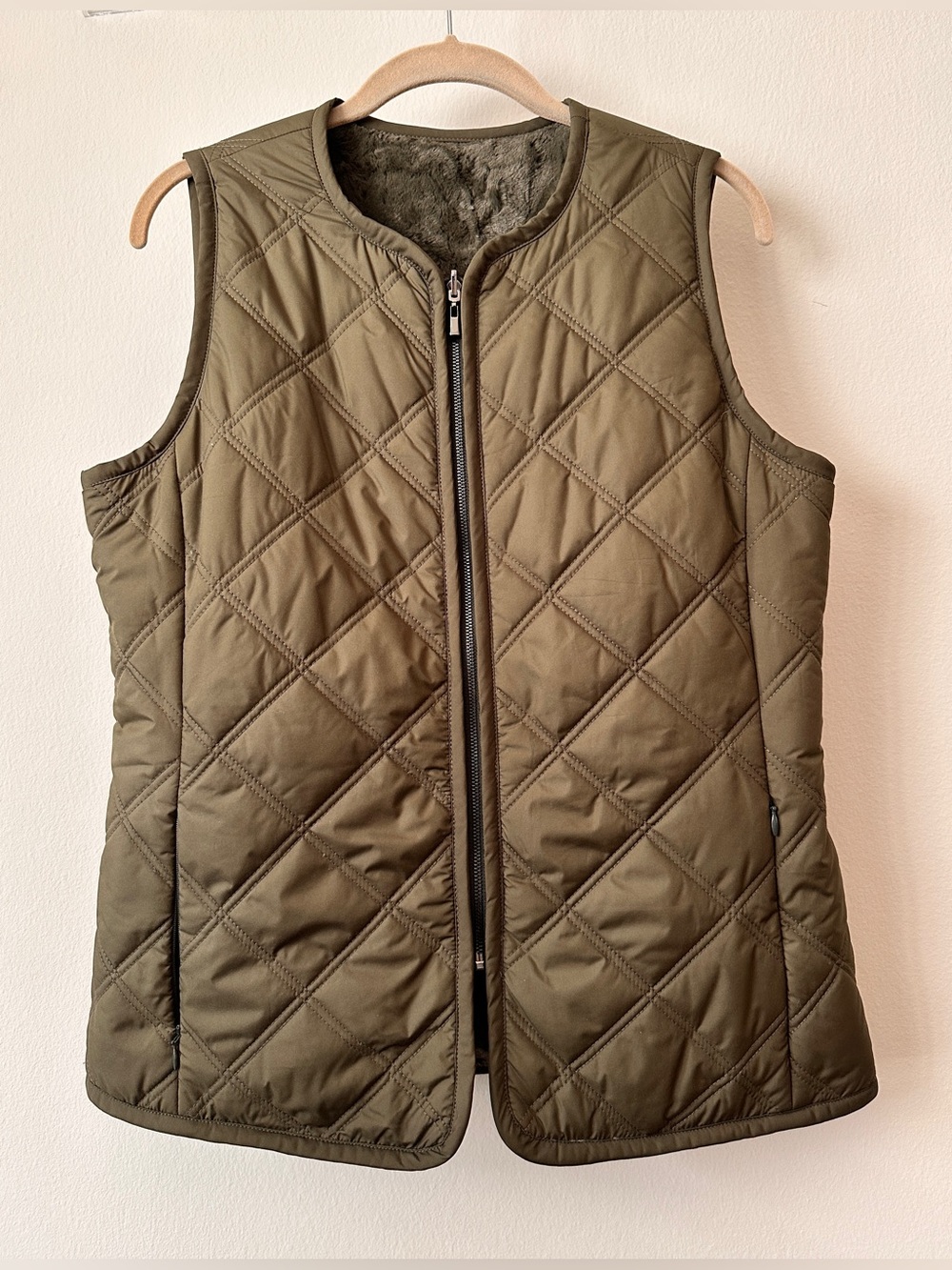 Etcetera Olive Quilted Sleeveless Reversible Vest with two zip pockets.